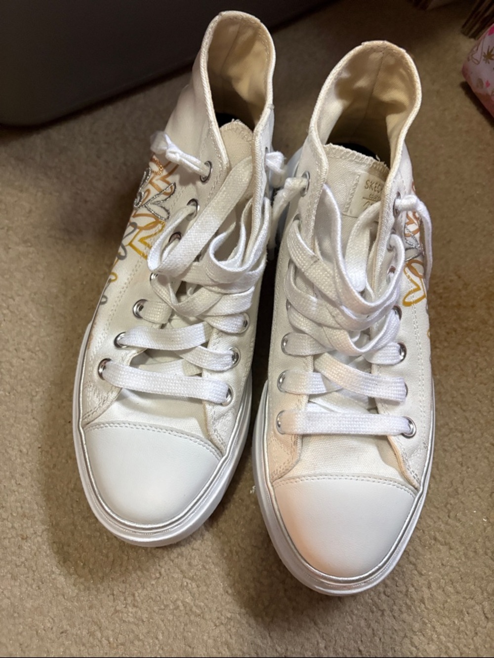 Skechers White High-Top Sneakers with Gold Script Detail